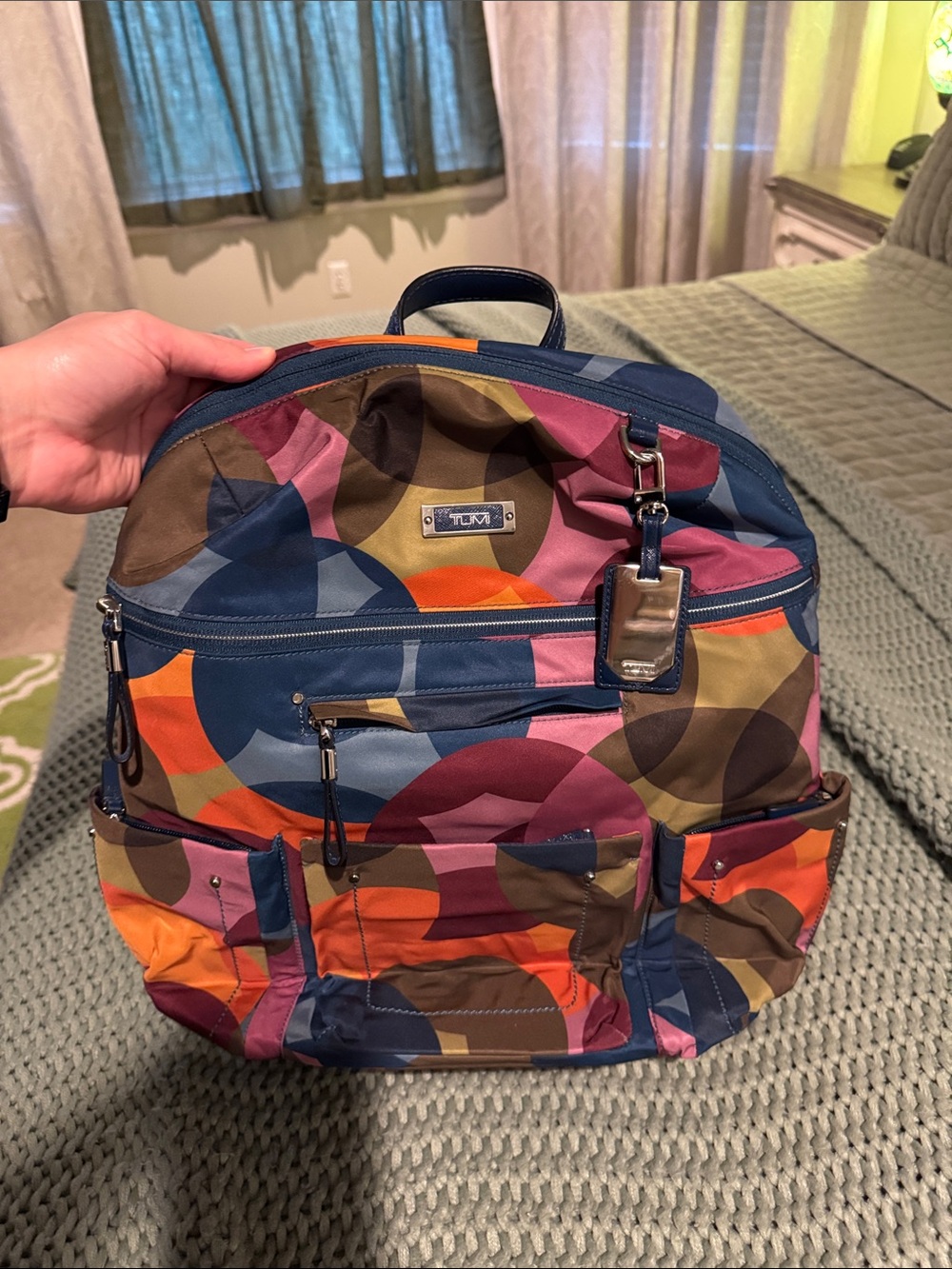 Tumi Multicolor Circular Print Backpack with Navy Trim